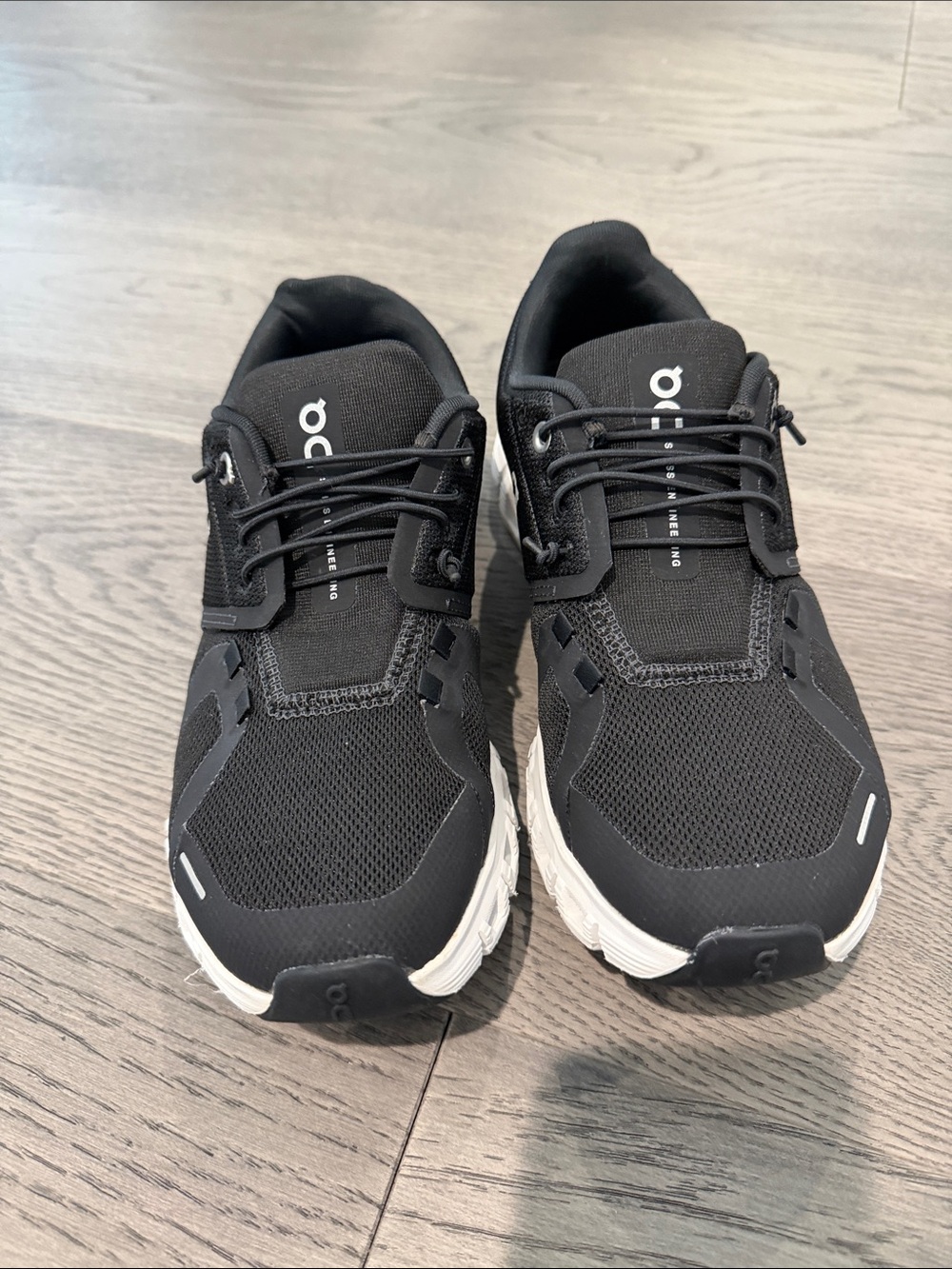On Running Women's Black and White Athletic Sneakers